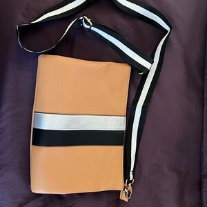 Crossbody with wristlet. Brand new.